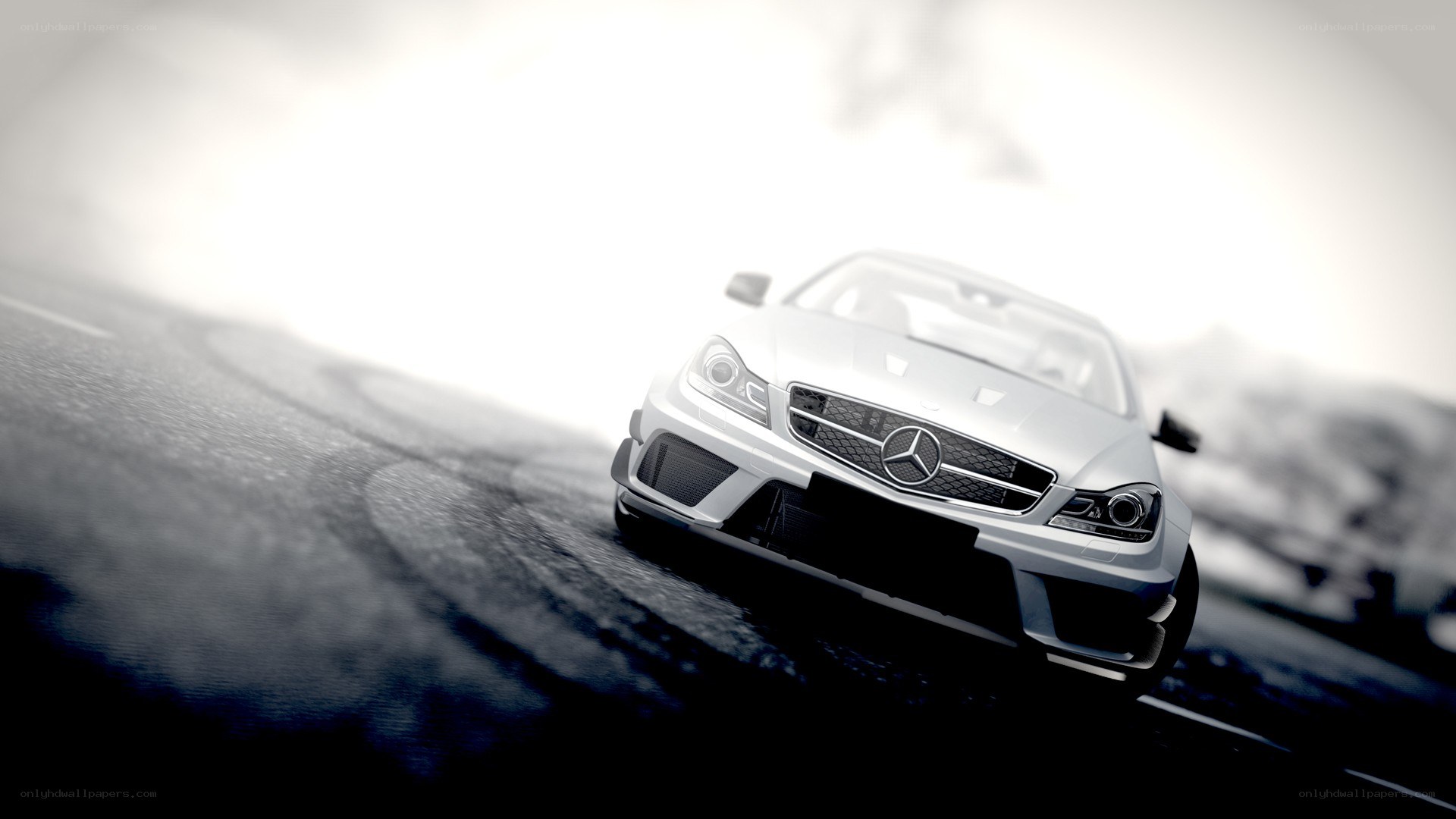 white mercedes on a racetrack