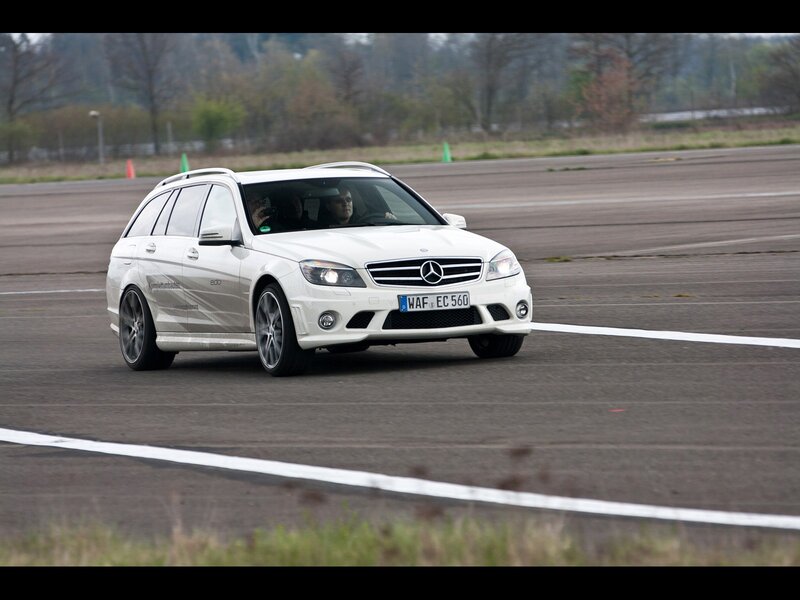 white mercedes on a track