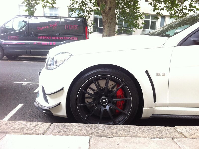 white mercedes parked on street