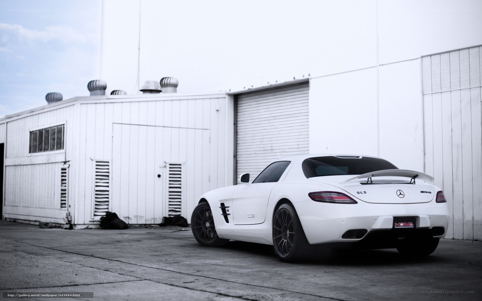 white mercedes sls amg parked