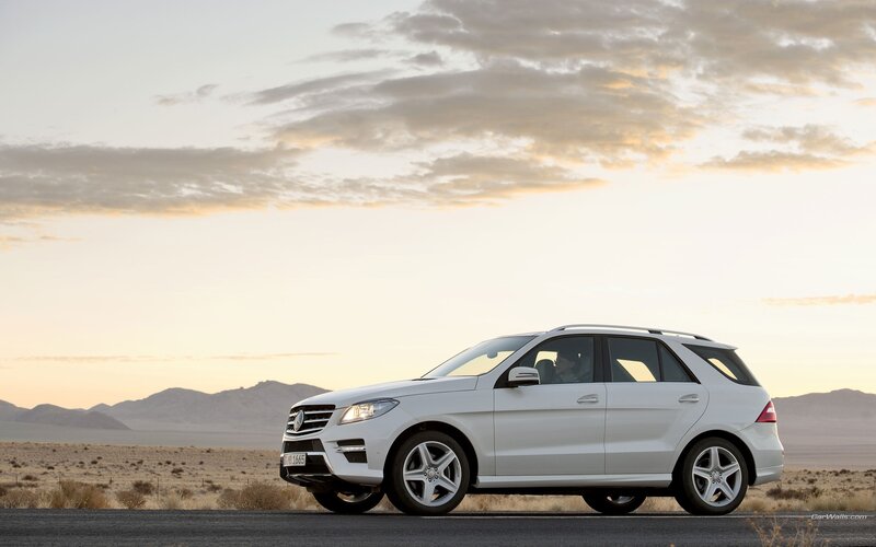 white mercedes suv in desert