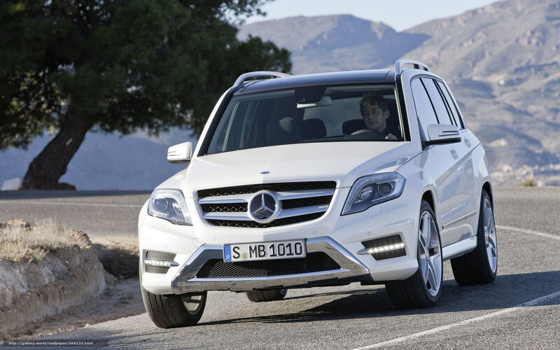 white mercedes suv on road