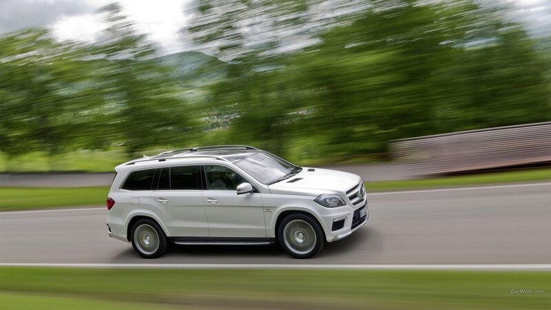 white mercedes suv on road