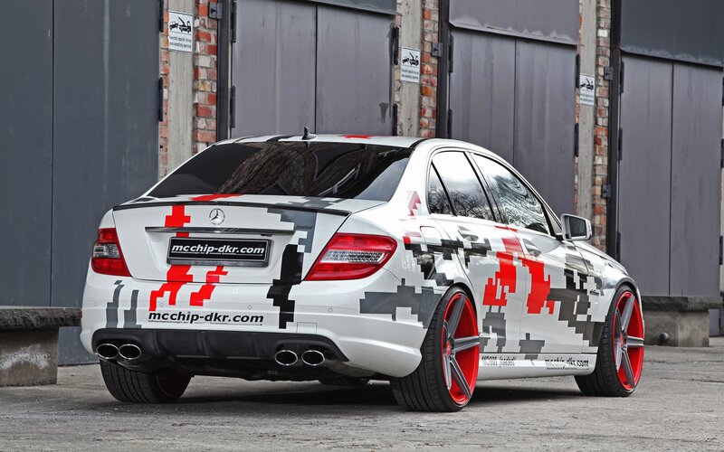 white mercedes with red and black graphics
