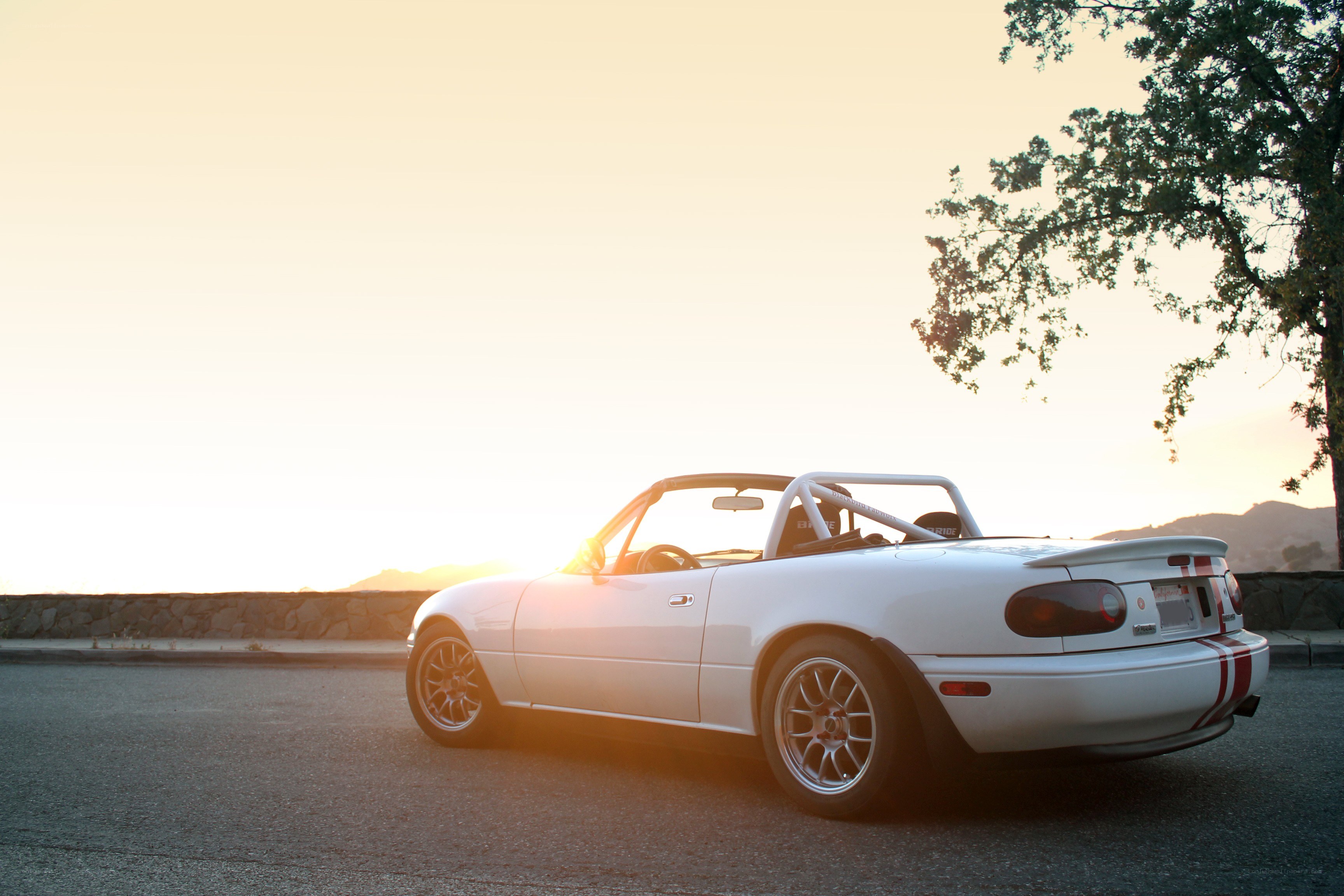 White Miata at sunset