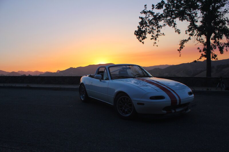 White Miata at sunset