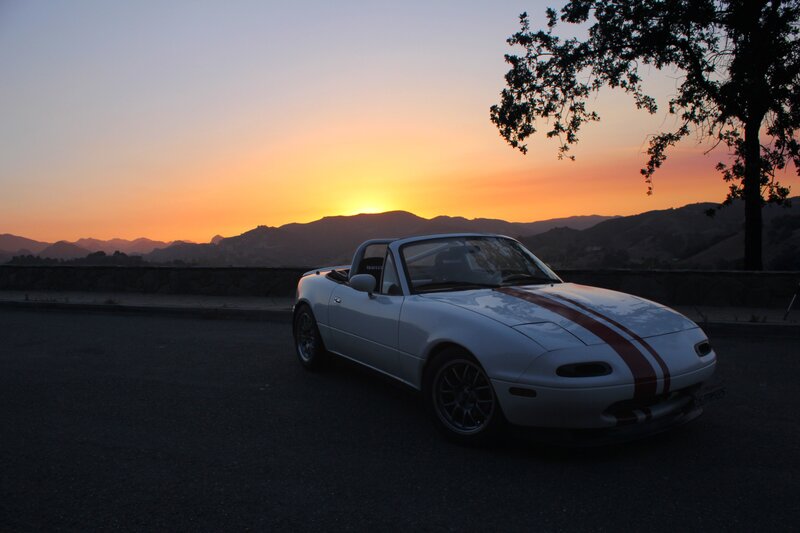 White Miata at sunset