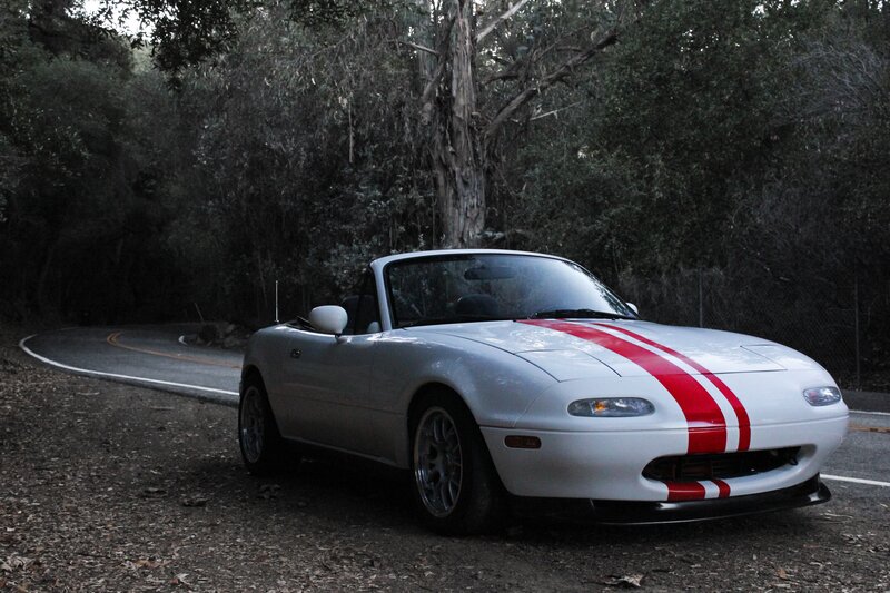 White Miata with red stripes