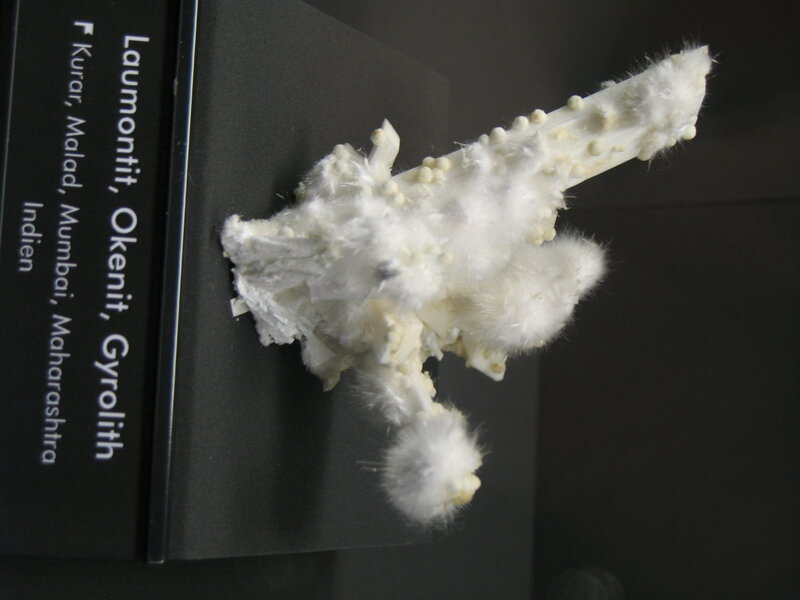 White mineral specimen display