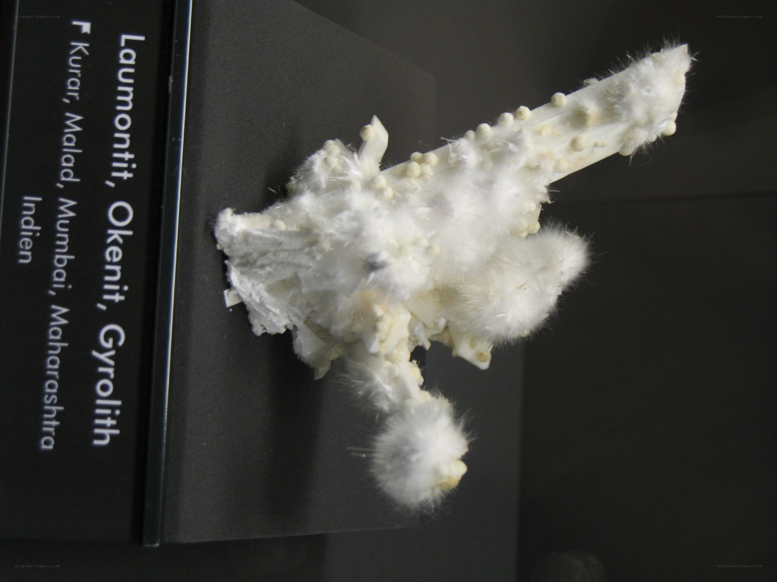 White mineral specimen display