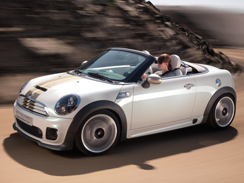 White MINI convertible driving