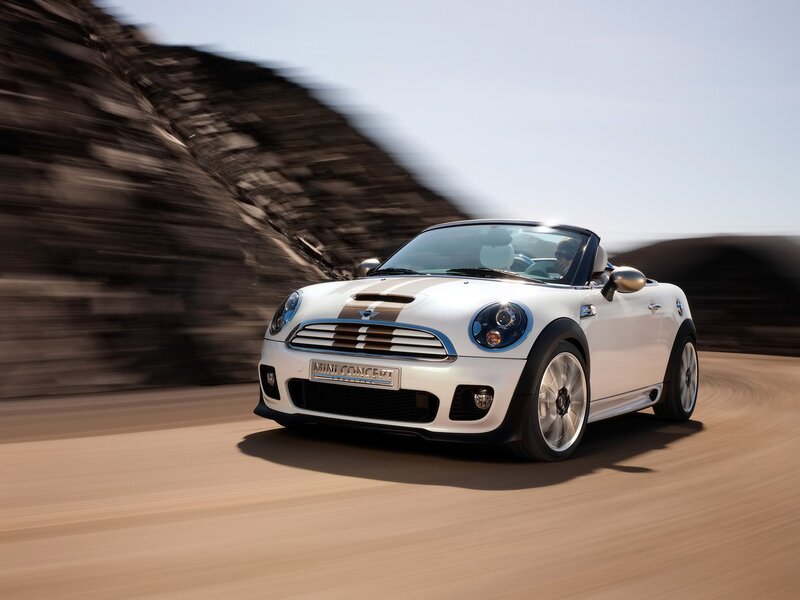 White MINI Convertible in motion