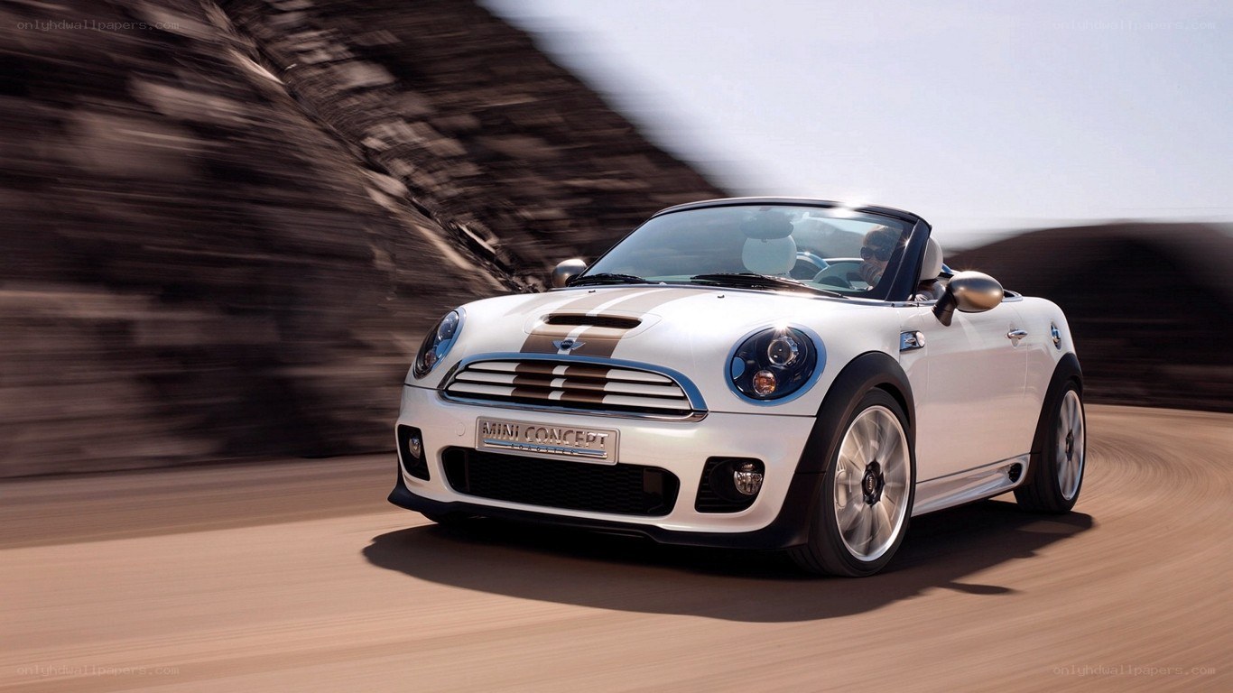 White MINI Convertible in motion