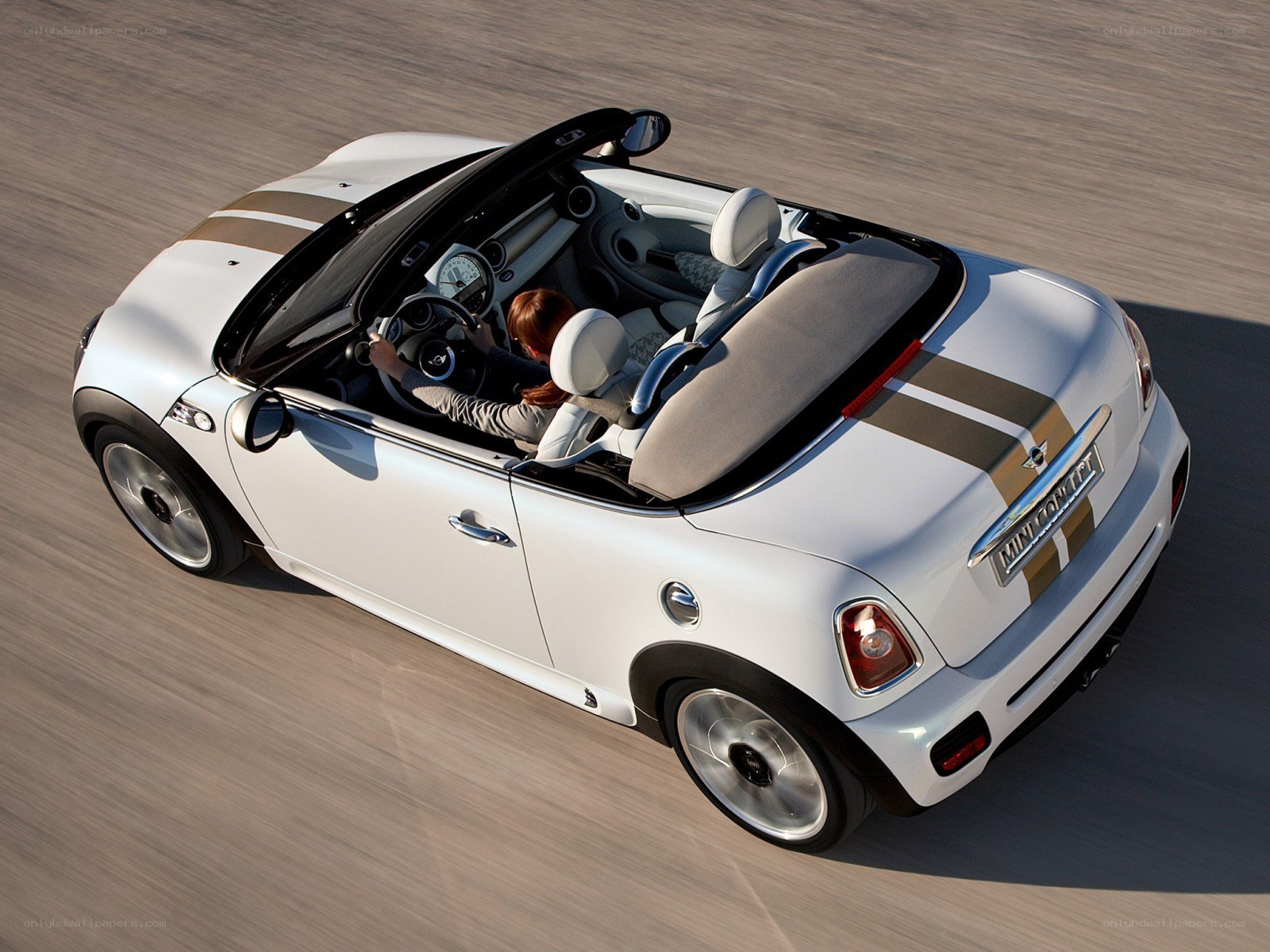White MINI Convertible in motion