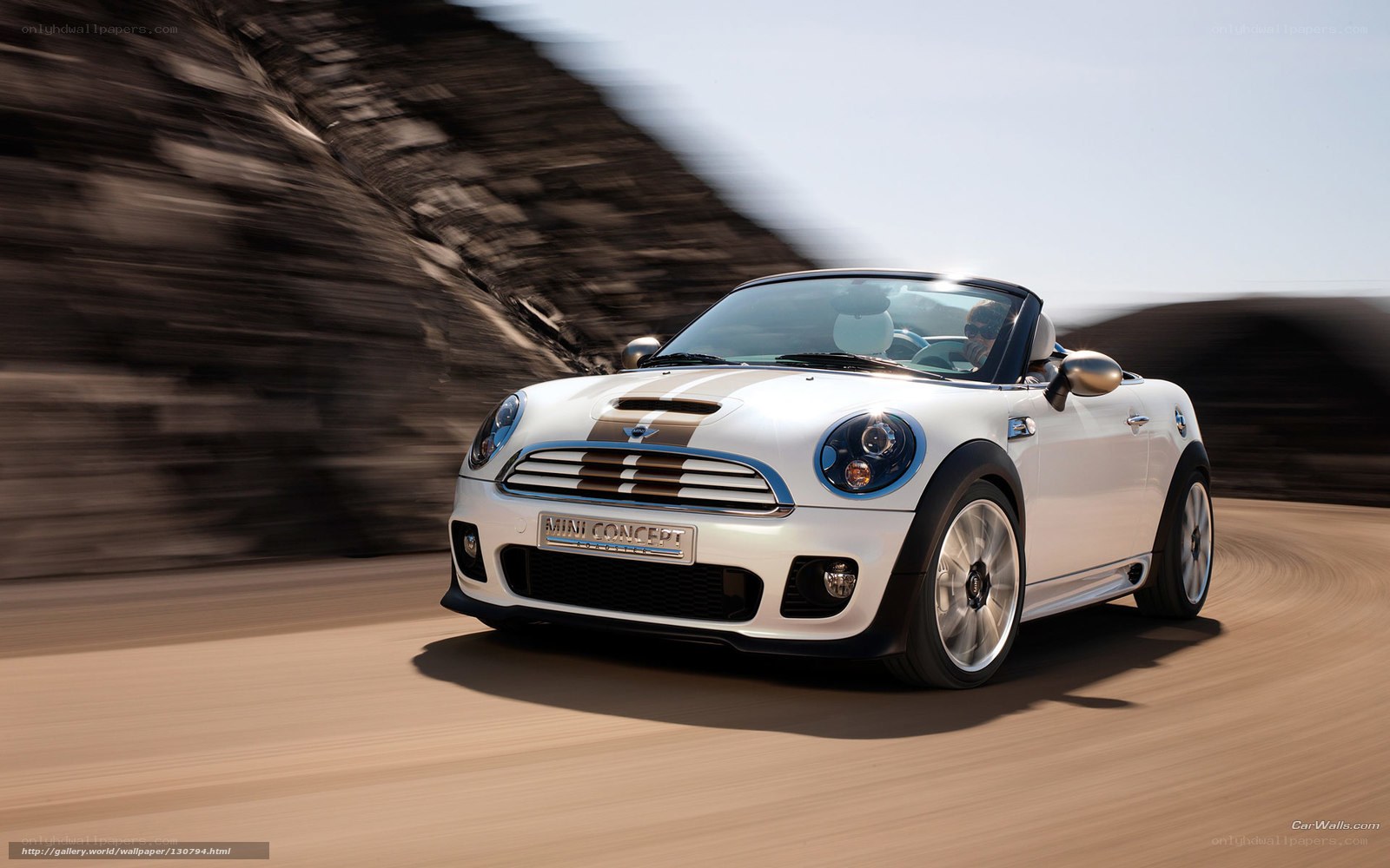 White MINI Convertible in Motion