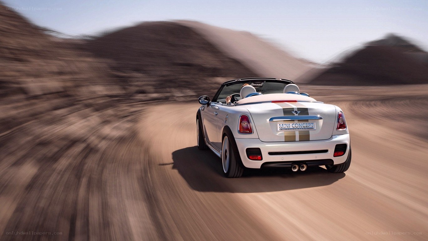 White MINI convertible on desert road
