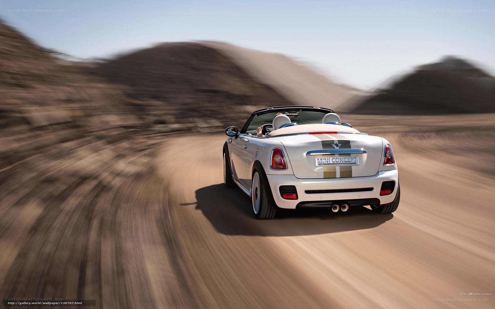 White MINI convertible on desert road