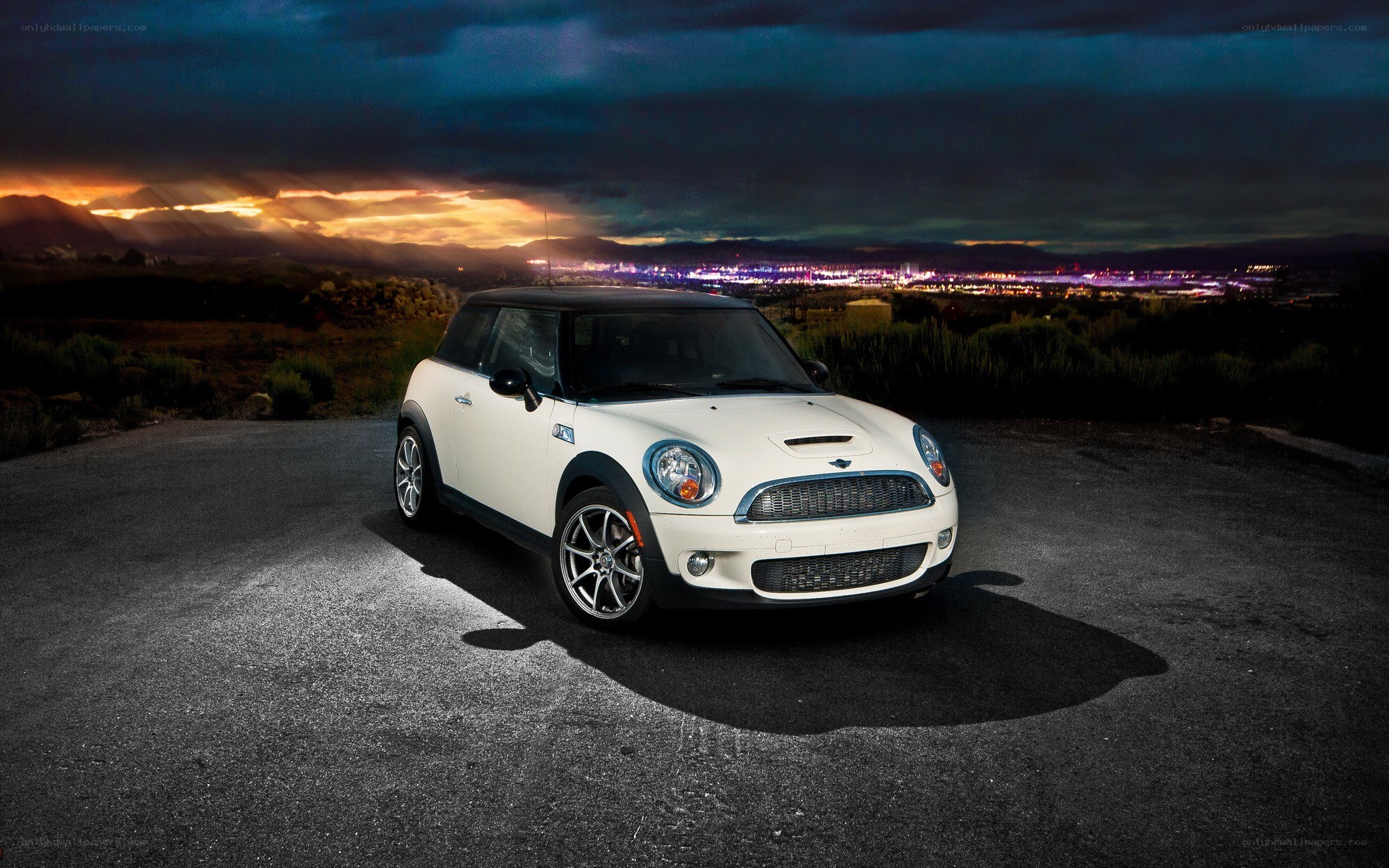 White Mini Cooper at dusk