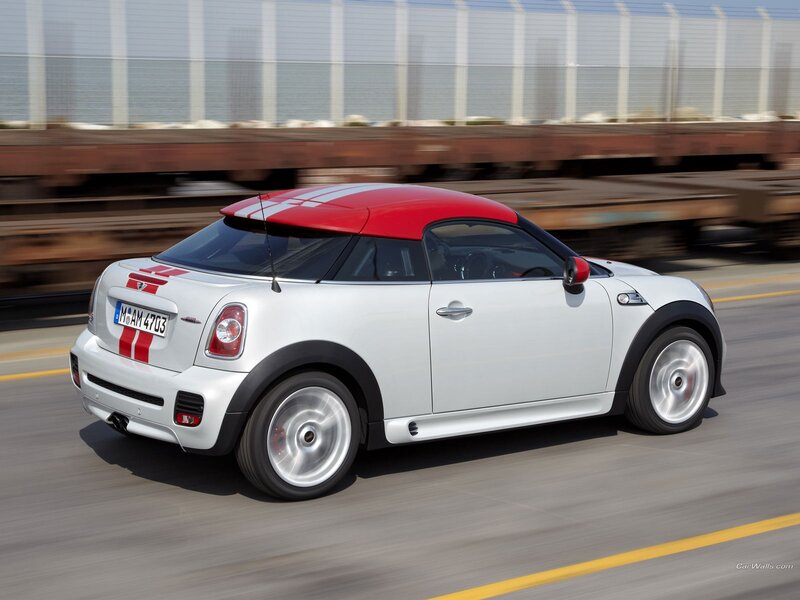 white mini cooper on road