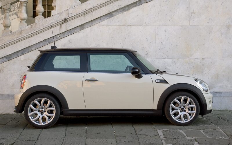 white mini cooper parked