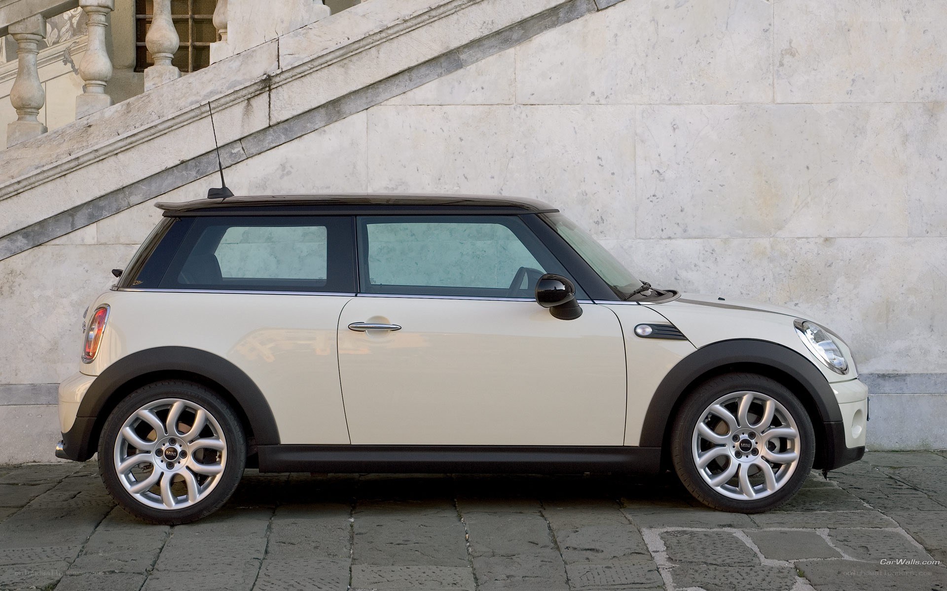 white mini cooper parked