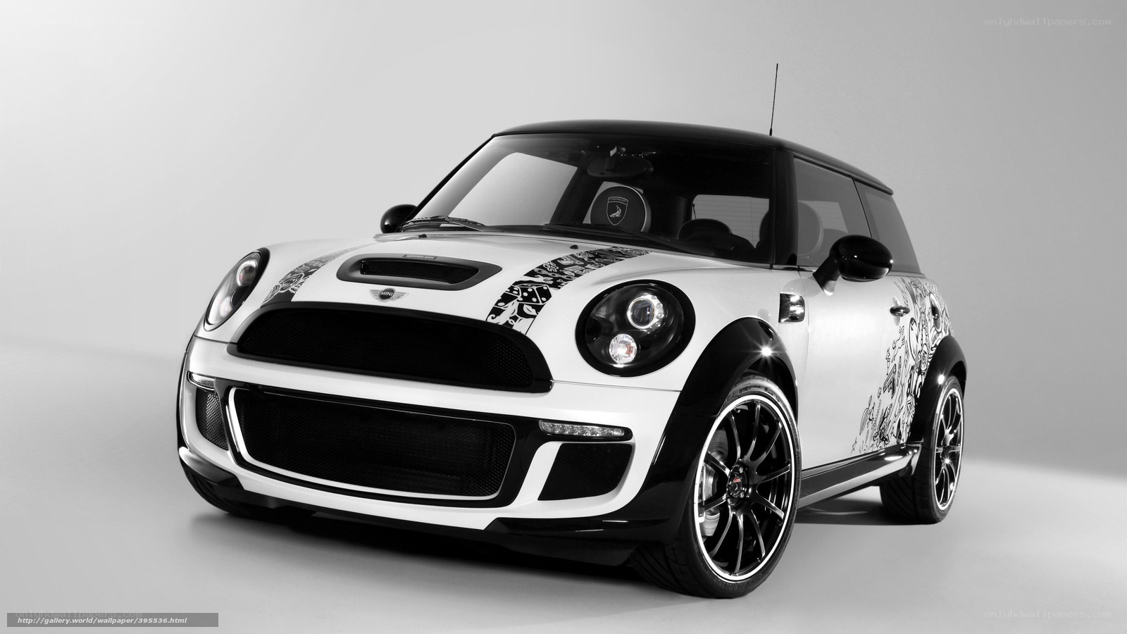 white mini cooper with decals