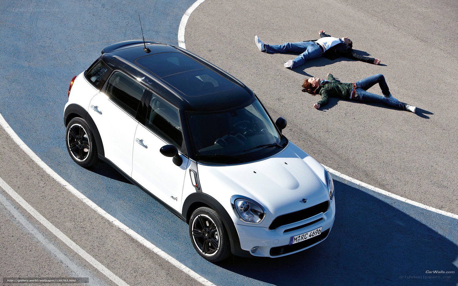 White MINI Countryman on track