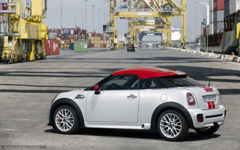 White MINI Coupe at port