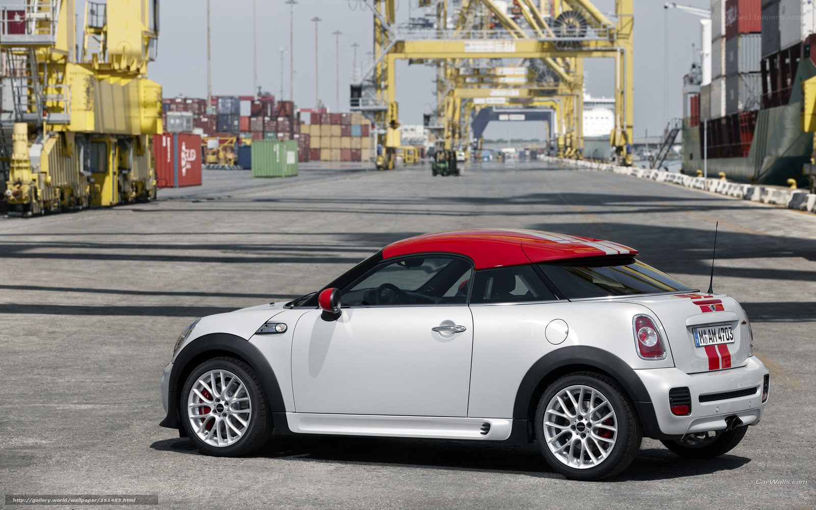 White MINI Coupe at port