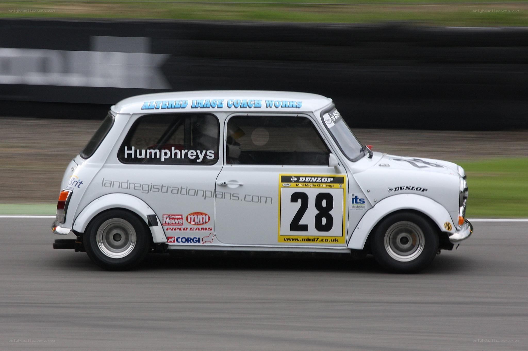 White Mini race car on track