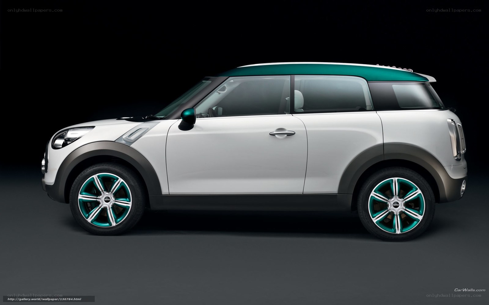 white mini suv with teal accents