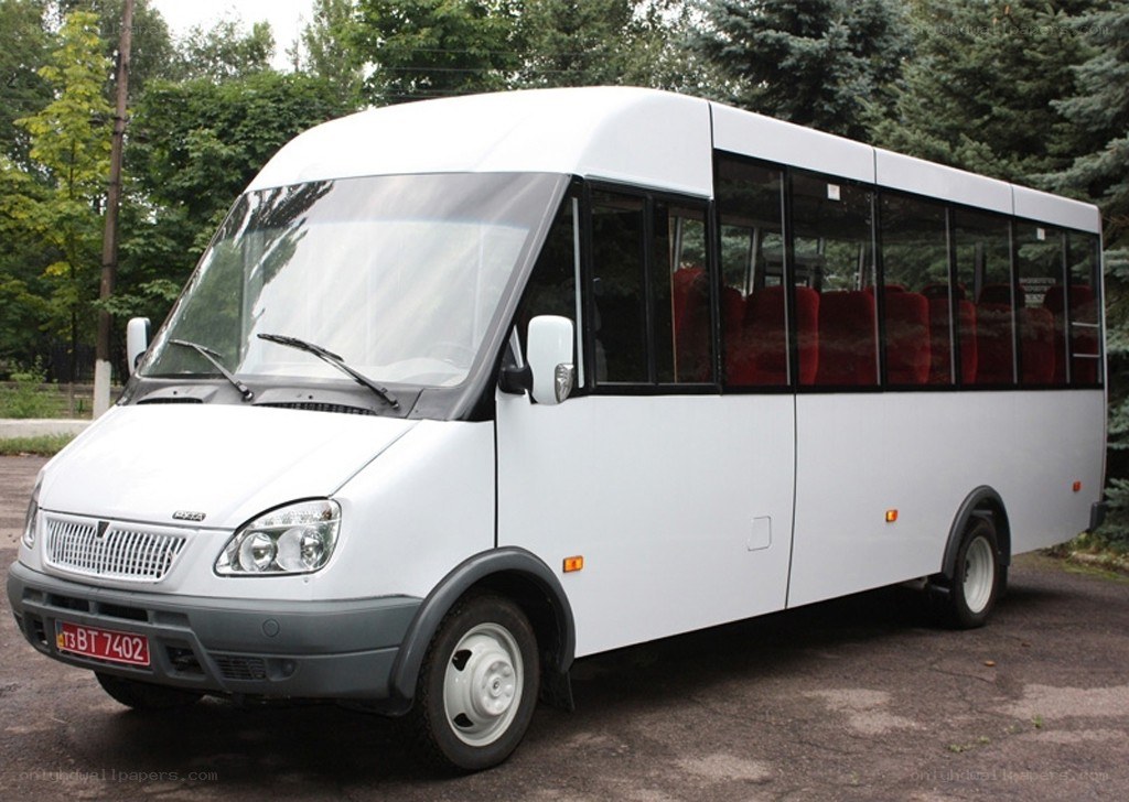 White minibus parked outdoors