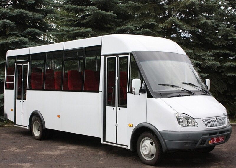 white minibus with red seats