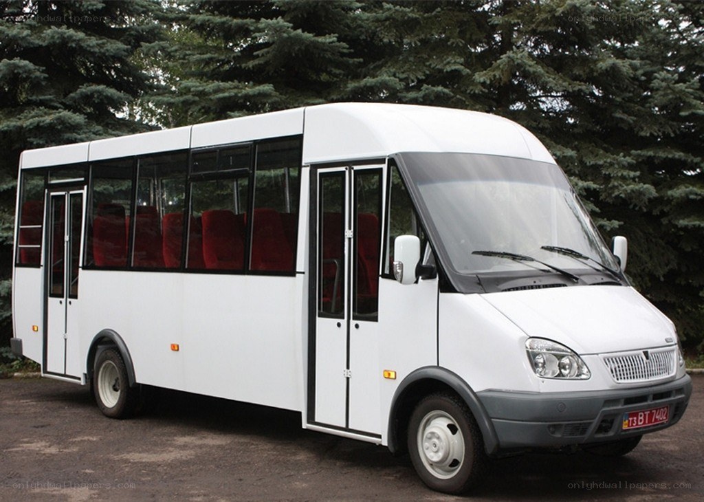 white minibus with red seats