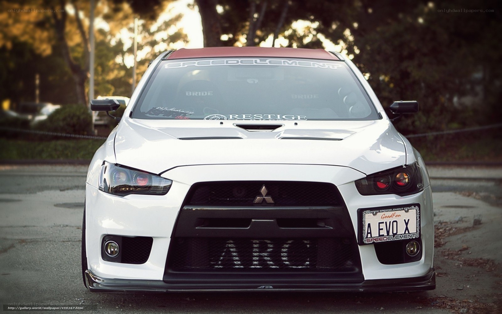 white mitsubishi evo car
