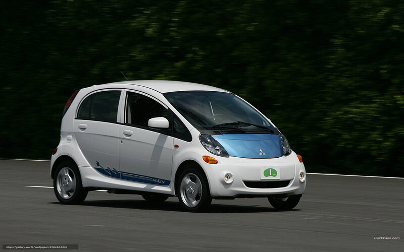 White Mitsubishi i-MiEV in motion