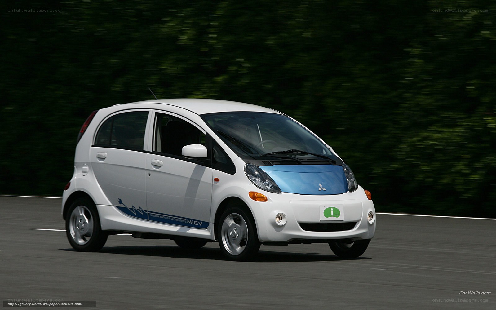 White Mitsubishi i-MiEV in motion