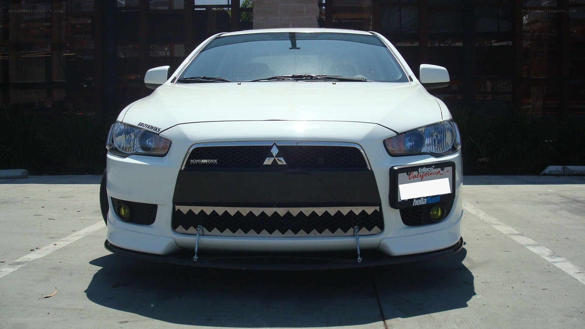 white mitsubishi lancer