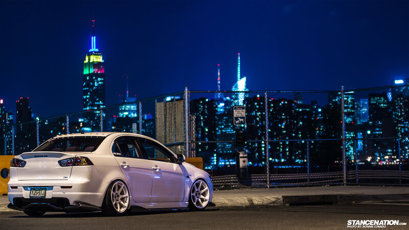 White Mitsubishi Lancer — Blue