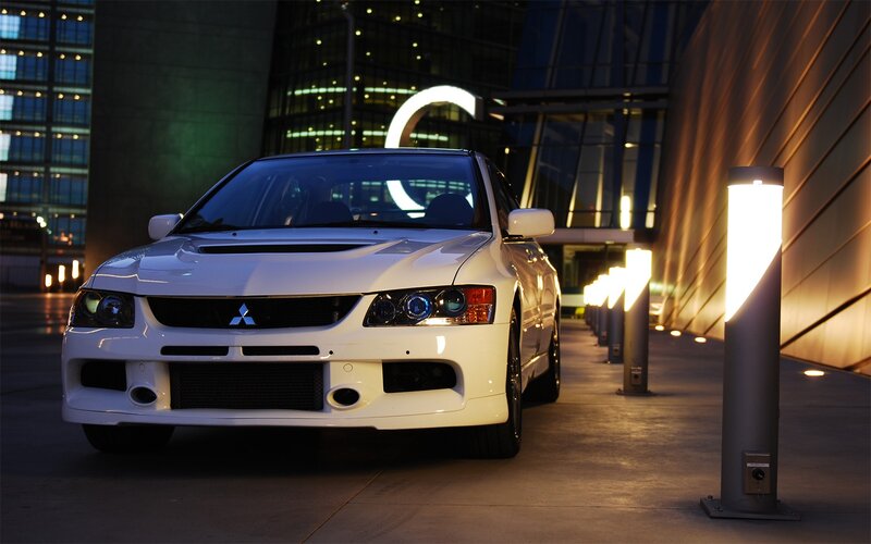 White Mitsubishi Lancer — Dramatic, Night, Photograph, Car, Building
