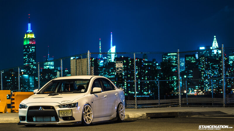 White Mitsubishi Lancer — Dramatic, Night, Photograph, City Skyline