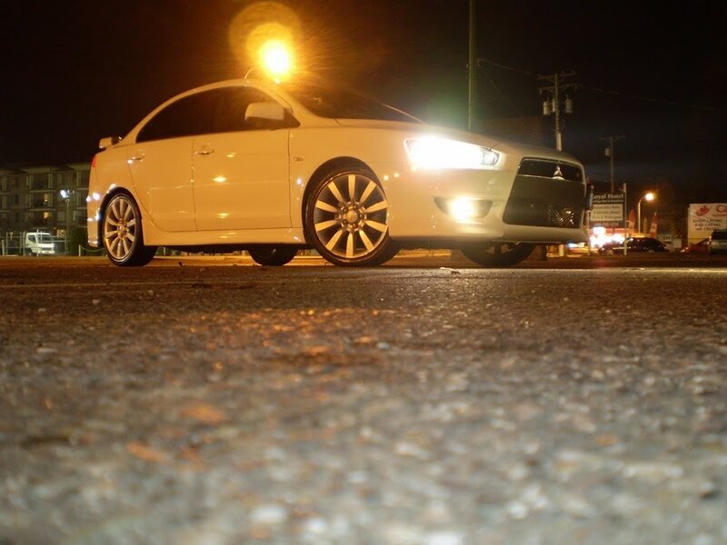 White Mitsubishi Lancer — Dramatic, Night