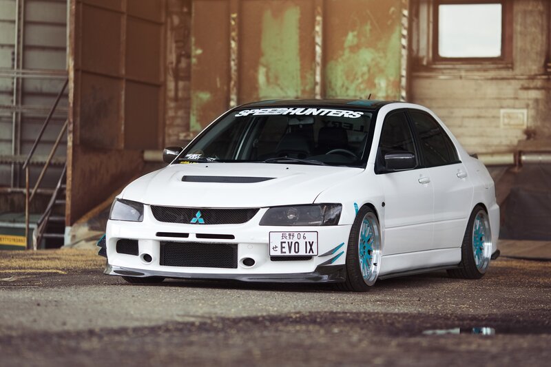 White Mitsubishi Lancer — Dramatic, Photograph, Car, Building