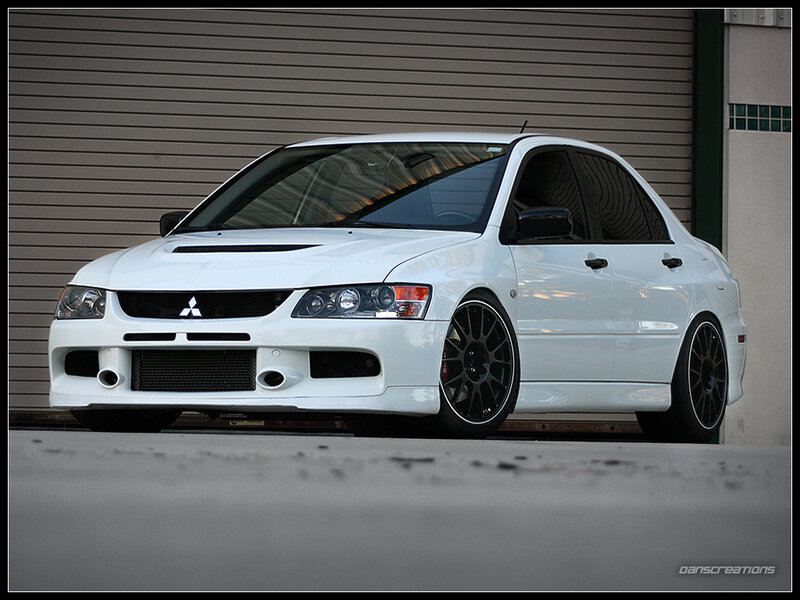 White Mitsubishi Lancer — Dramatic, Photograph, Car, Building, Tires
