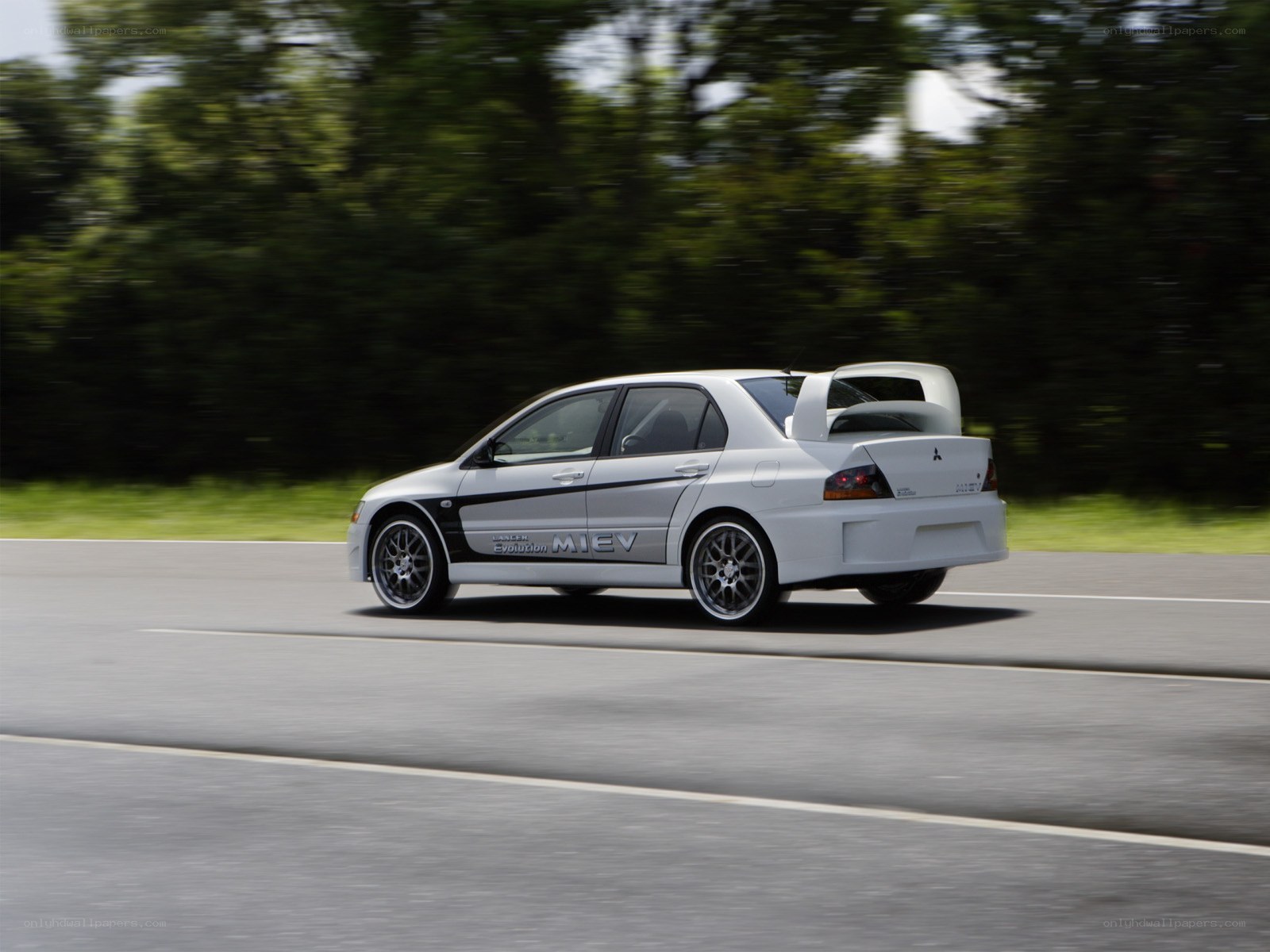 white mitsubishi lancer evol mi-iv