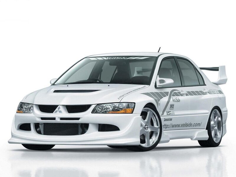 white mitsubishi lancer evolution