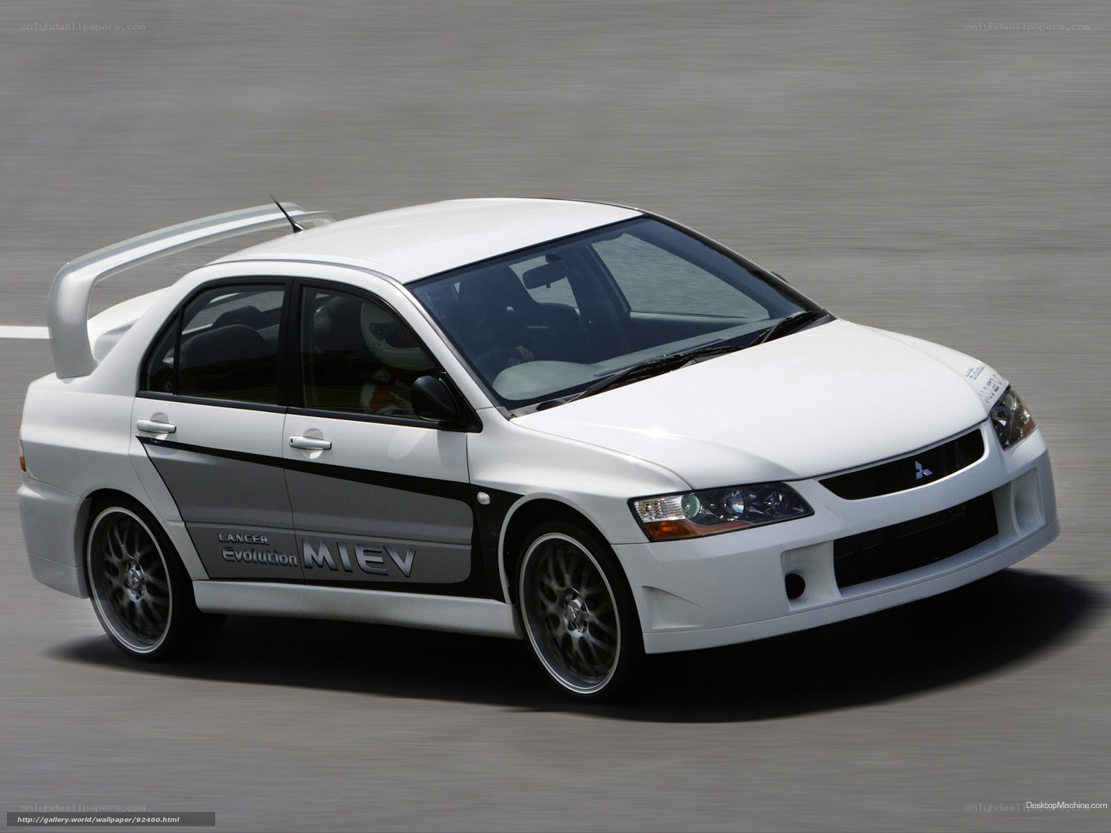 white mitsubishi lancer evolution