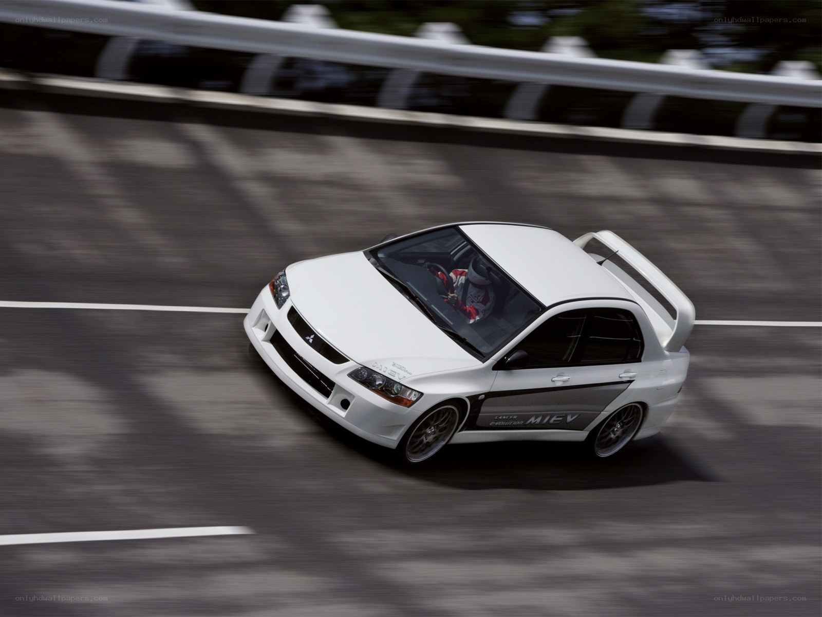 white mitsubishi lancer evolution