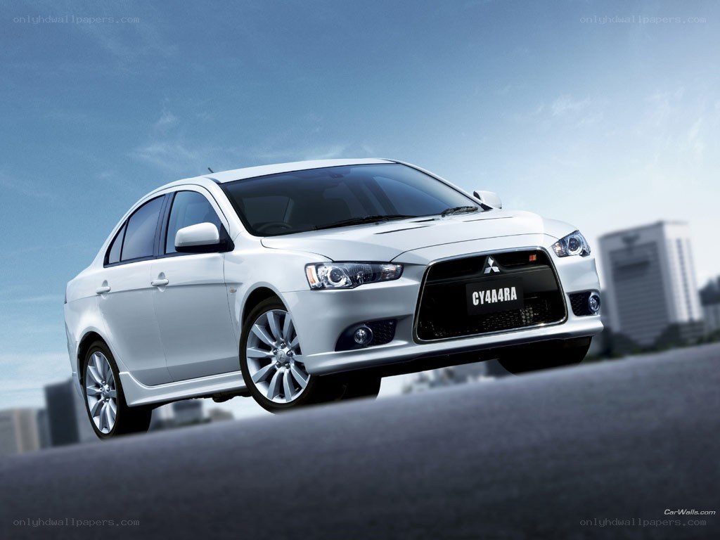 white mitsubishi lancer sedan