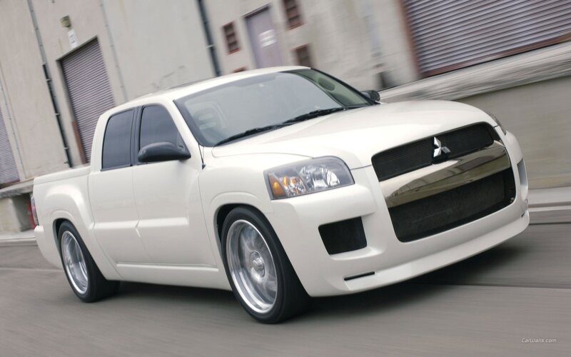 white mitsubishi pickup truck